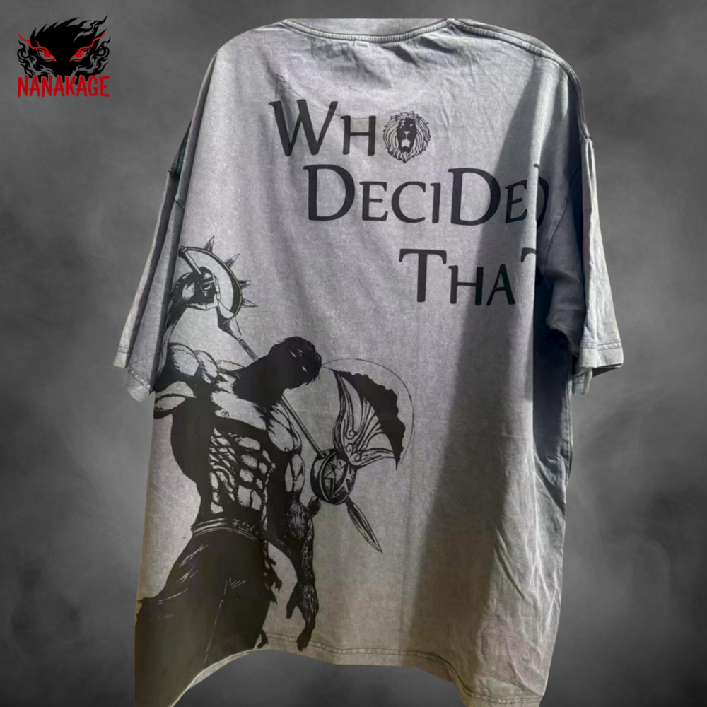 Gray t-shirt with graphic design and text 'Who Decided That?' on a dark background