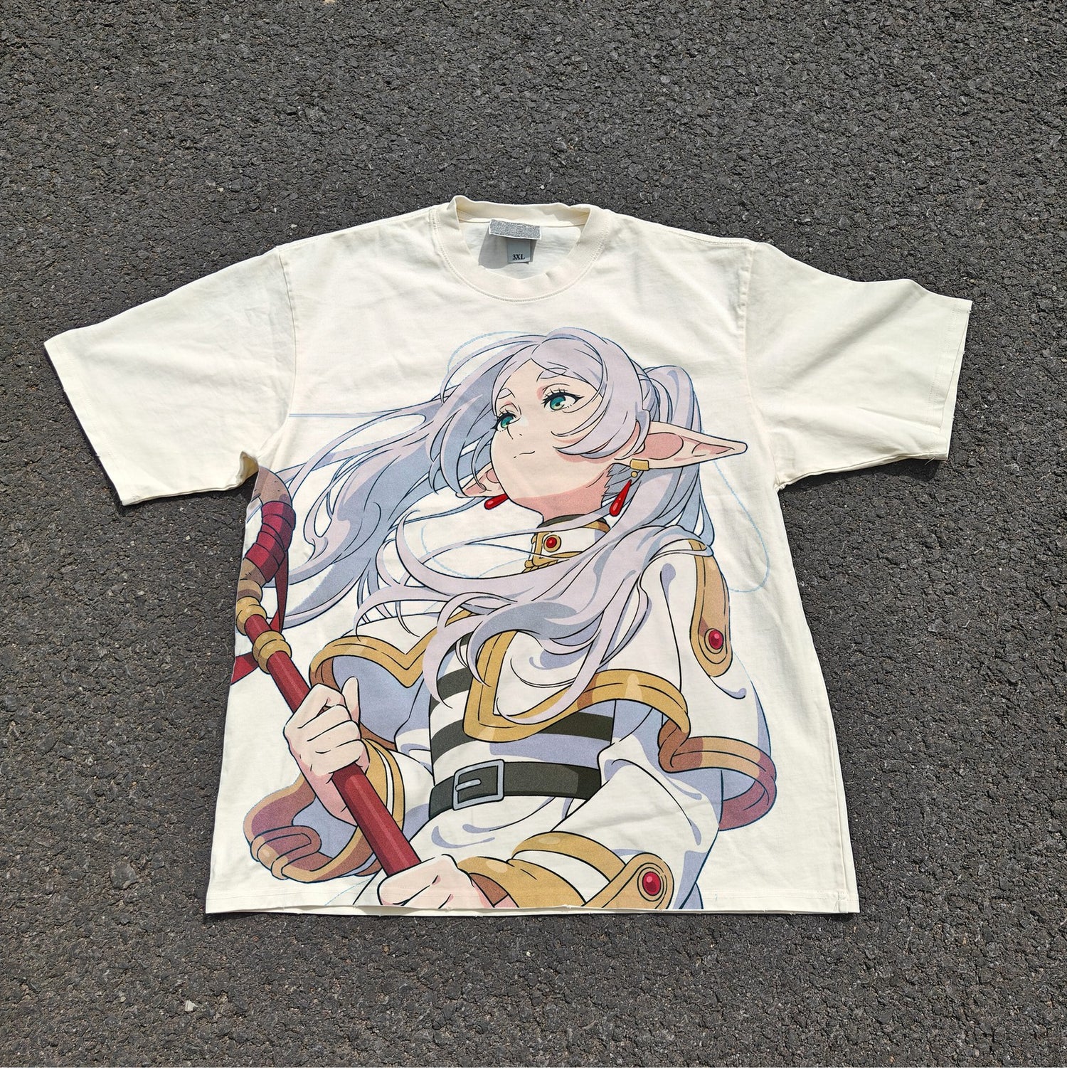 Acid-wash oversized all-over-print tee with Frieren anime graphic print.