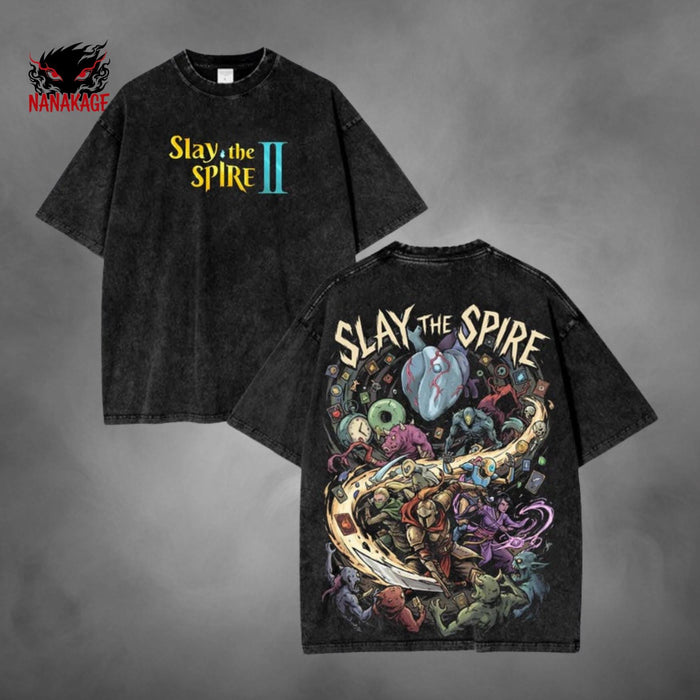 Black acid-wash oversized t-shirt with Slay The Spire indie game graphic print.