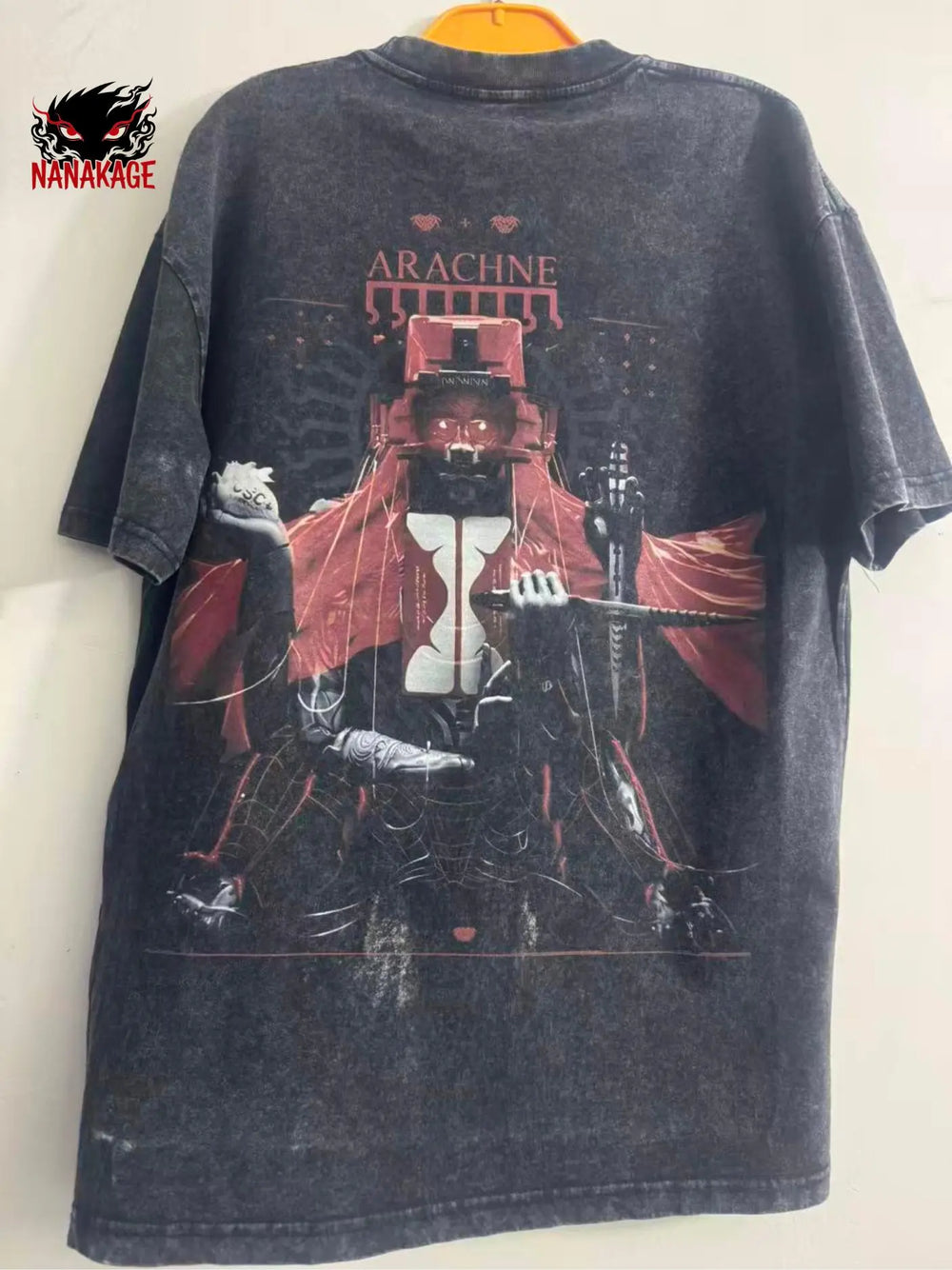 Black acid-wash oversized t-shirt with Arachne video game graphic print.