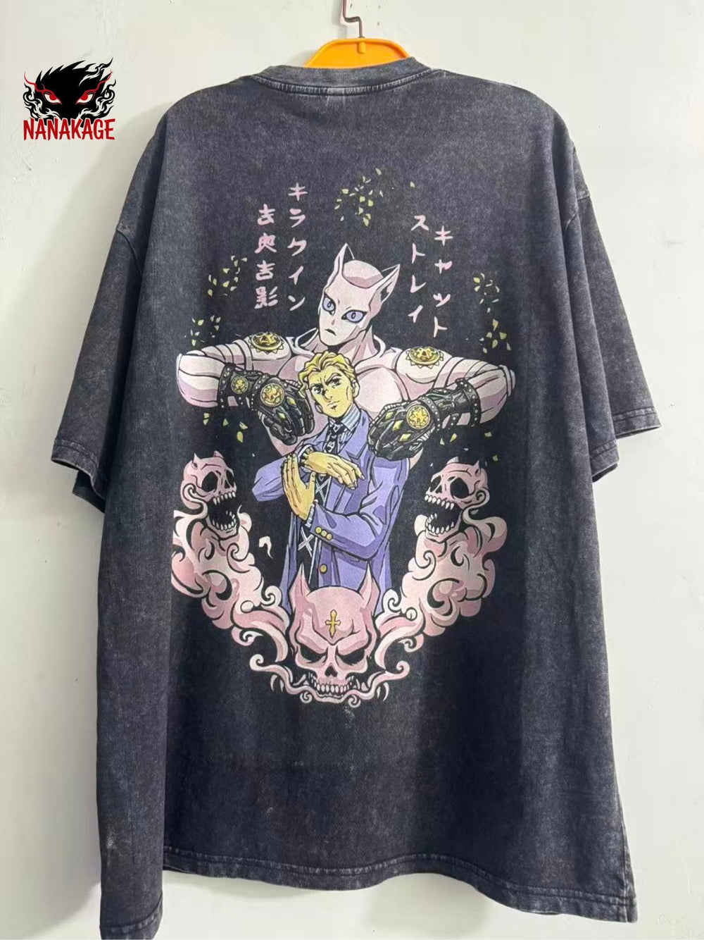 Black acid-wash oversized t-shirt with Kira anime graphic print.