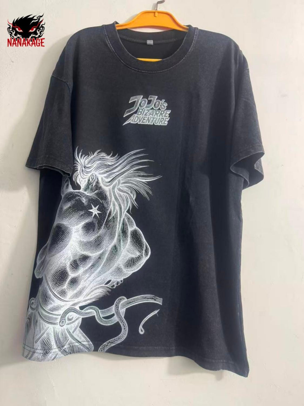 Black acid-wash oversized t-shirt with Steel Ball Run anime graphic print.