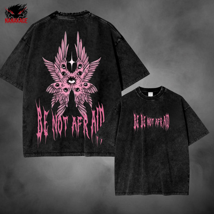 Black acid-wash oversized t-shirt with Be Not Afraid Christian streetwear graphic print.