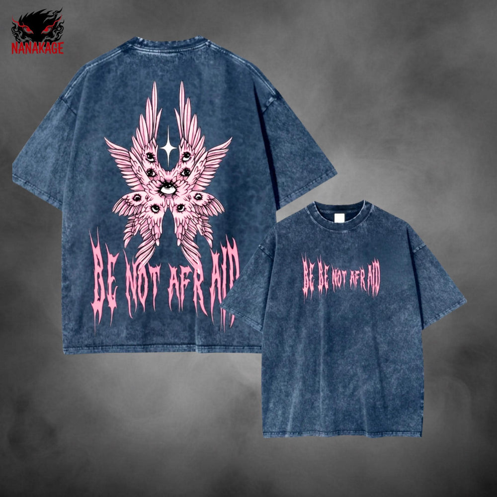 Pink acid-wash oversized t-shirt with Be Not Afraid Christian streetwear graphic print.