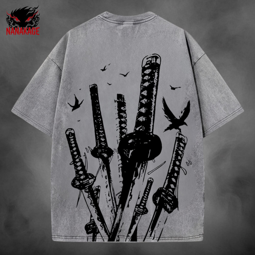 Black acid-wash oversized t-shirt with Vagabond manga graphic print.