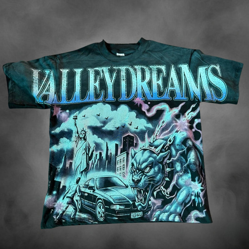 Teal oversized streetwear t-shirt with Valley Dreams NYC panther car city graphic print.